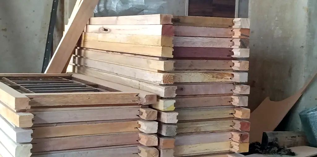 Ready wooden window frames stacked in the workshop